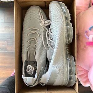 Brand new with tags, light gray sneaker.